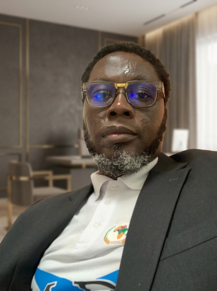 Portrait of Henry Mensah, Director · Trade & Logistics.